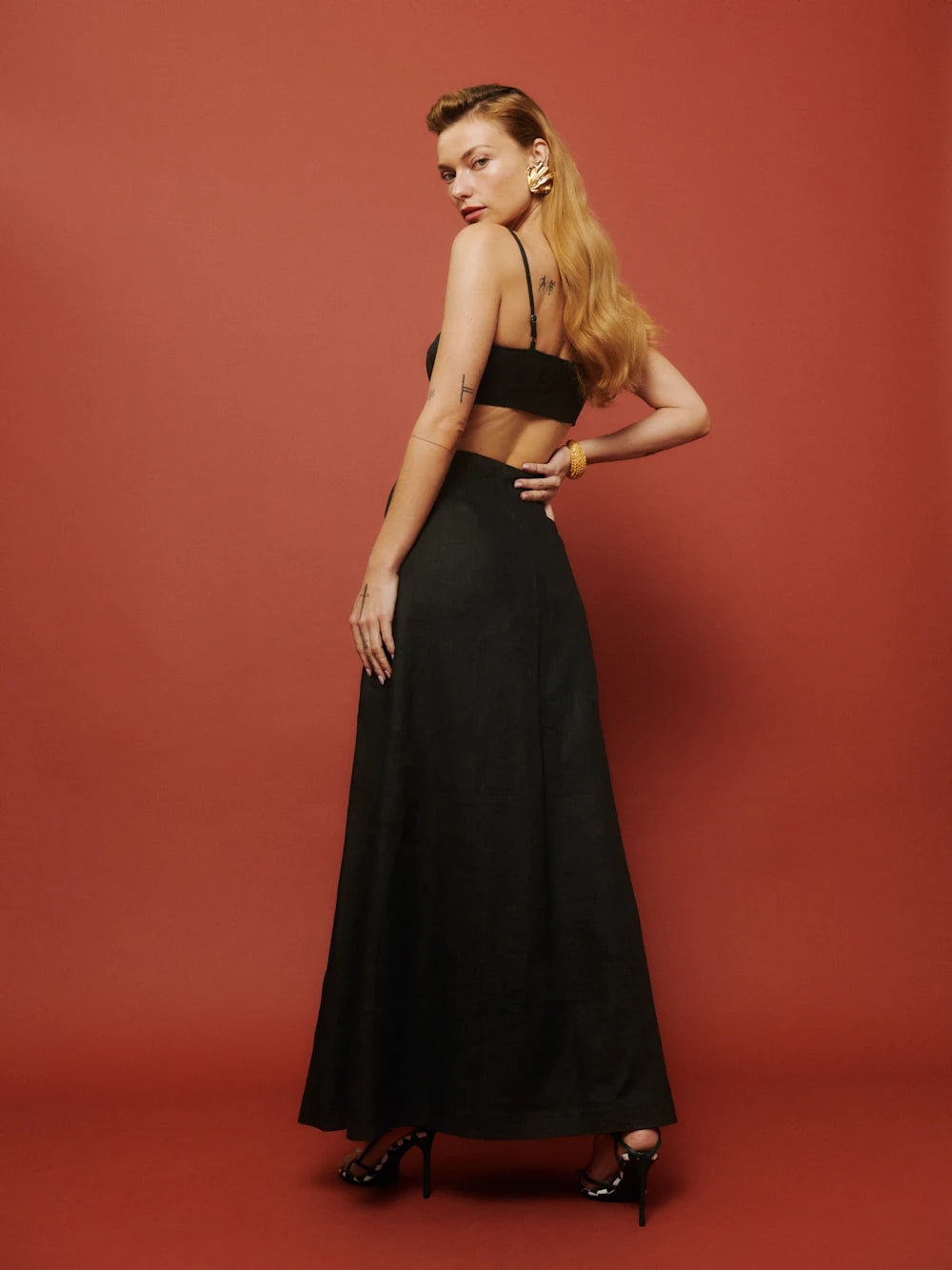 Maxi Skirt with a high rise and button front.